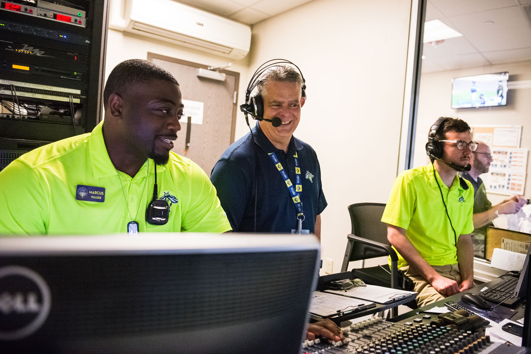 Columbia Fireflies team DJ Marcus Walker public address announcer Bryan Vacchio and broadcast producer Brendan McDowell